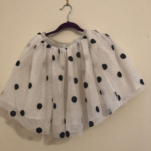 Girl's black and white polka dot skirt